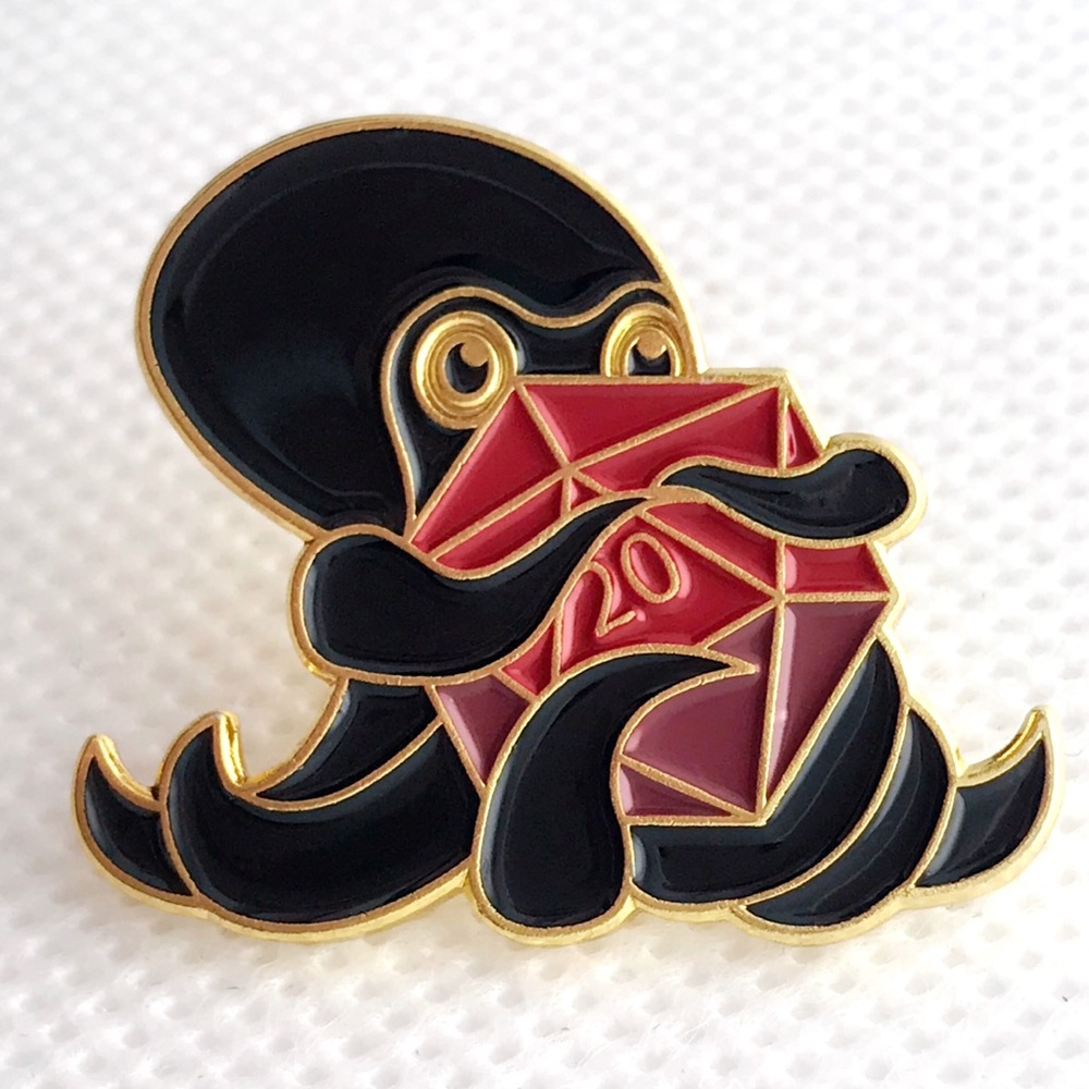 gold and red d20 pin